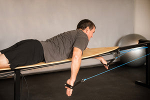 Training on the Surf Paddle Trainer